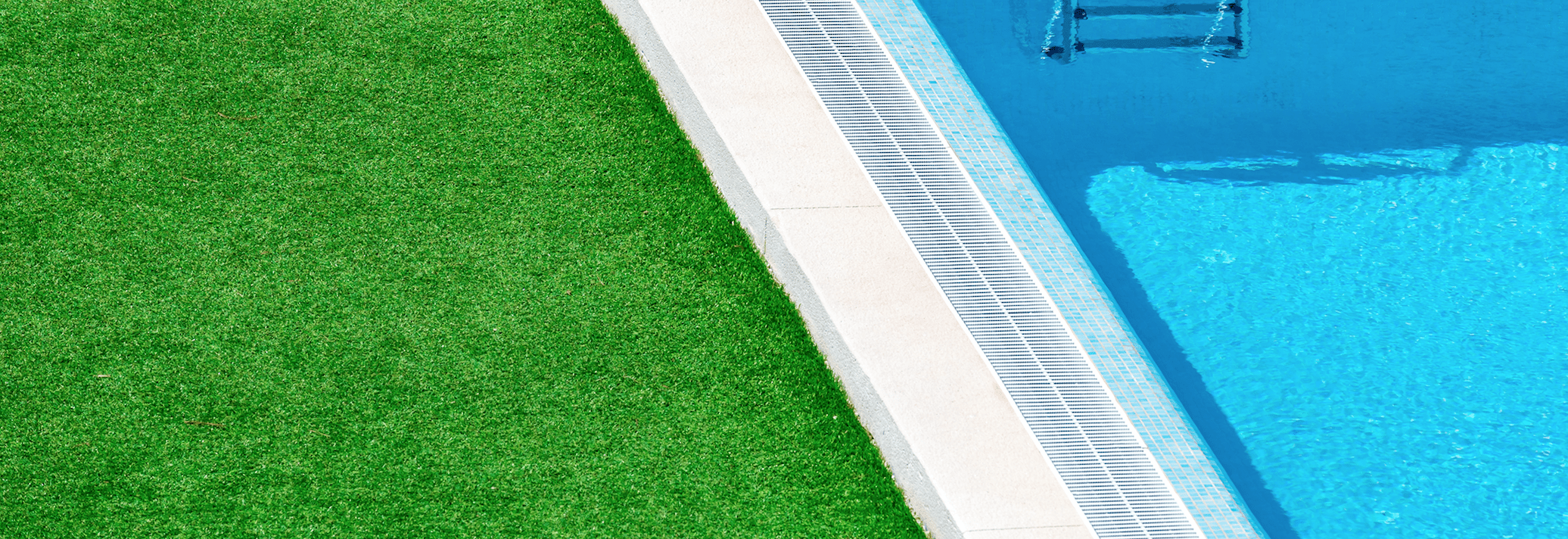 Grass next to pool