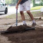 Spreading compost layer 2-3 inches before sod installation