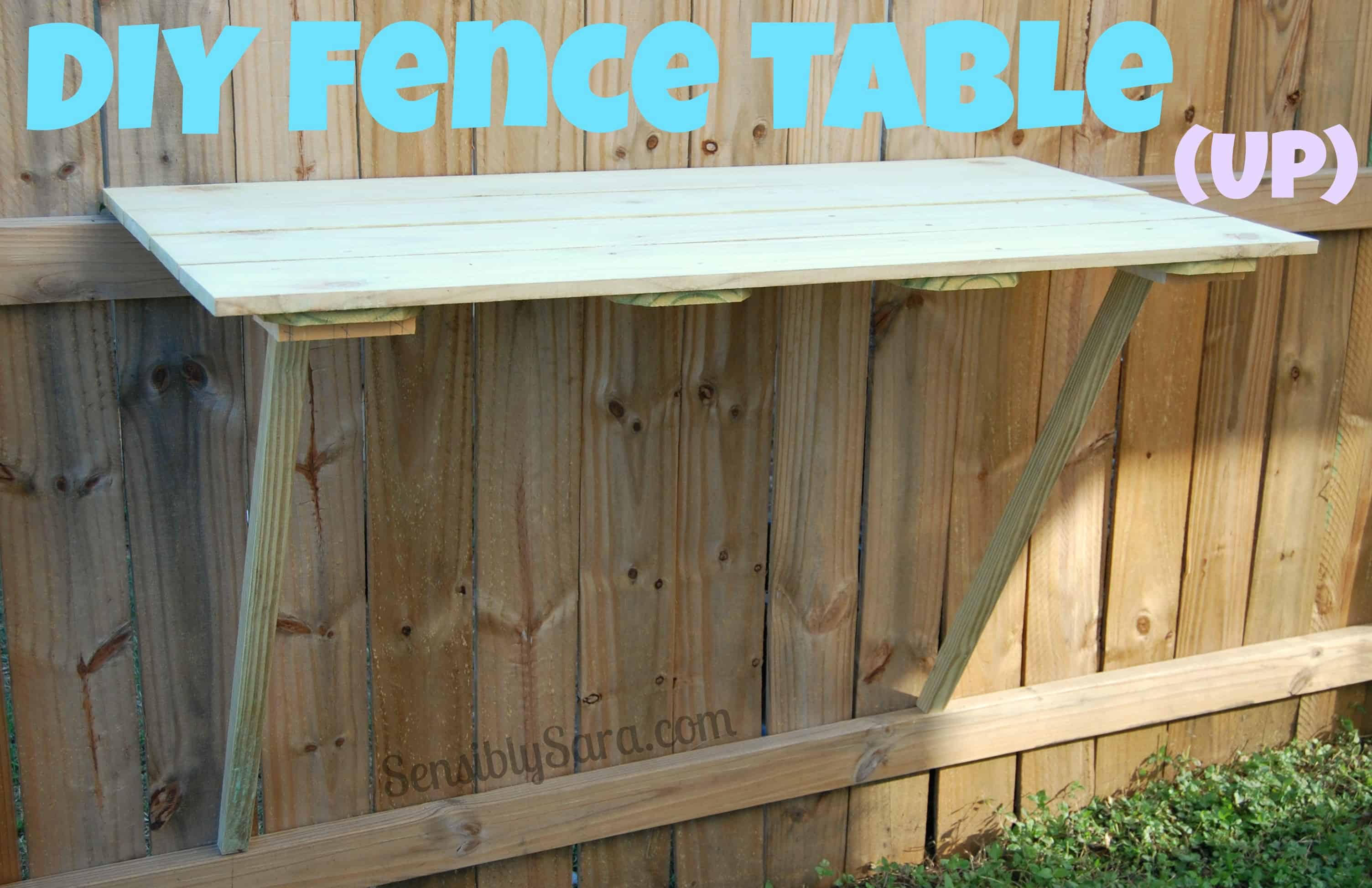 Table built into a fence in the up position